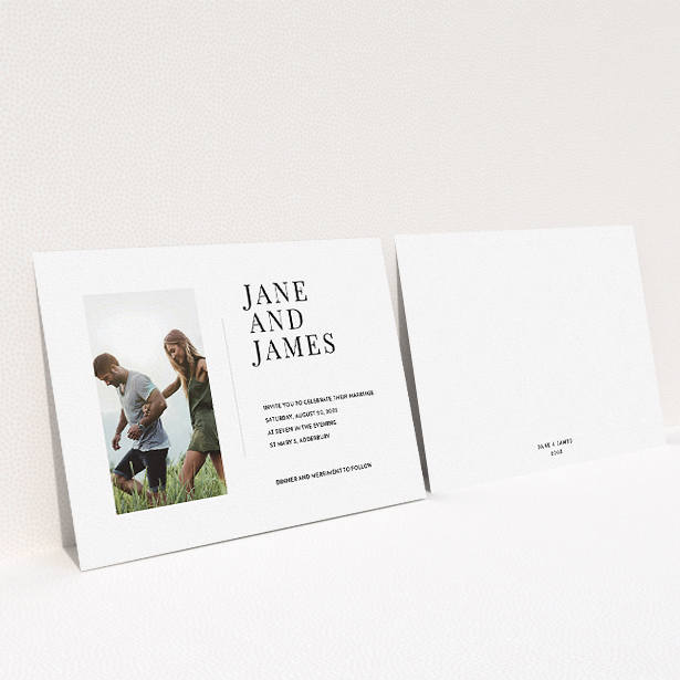 A wedding invite card template titled "Modern postcard". It is an A5 invite in a landscape orientation. It is a photographic wedding invite card with room for 1 photo. "Modern postcard" is available as a flat invite, with mainly white colouring.