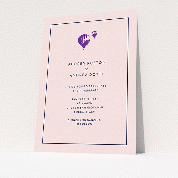 A wedding invite card called "Off and away". It is an A5 invite in a portrait orientation. "Off and away" is available as a flat invite, with tones of pink, purple and midnight blue.
