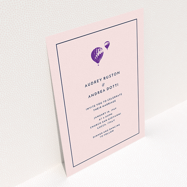 A wedding invite card called "Off and away". It is an A5 invite in a portrait orientation. "Off and away" is available as a flat invite, with tones of pink, purple and midnight blue.