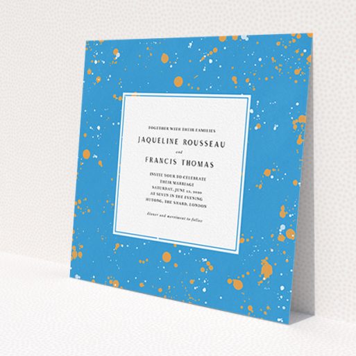 A wedding invite card design titled 'Orange Splatters'. It is a square (148mm x 148mm) invite in a square orientation. 'Orange Splatters' is available as a flat invite, with tones of light blue and orange.