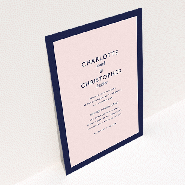 A wedding invite card design named "Script switch". It is an A5 invite in a portrait orientation. "Script switch" is available as a flat invite, with tones of navy blue and pink.