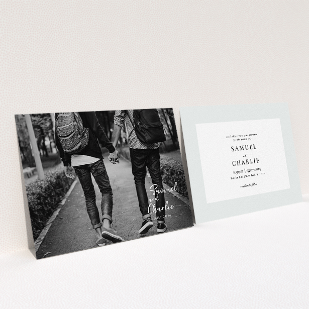 A wedding invite card design called "Soho Script". It is an A5 invite in a landscape orientation. It is a photographic wedding invite card with room for 1 photo. "Soho Script" is available as a flat invite, with mainly white colouring.