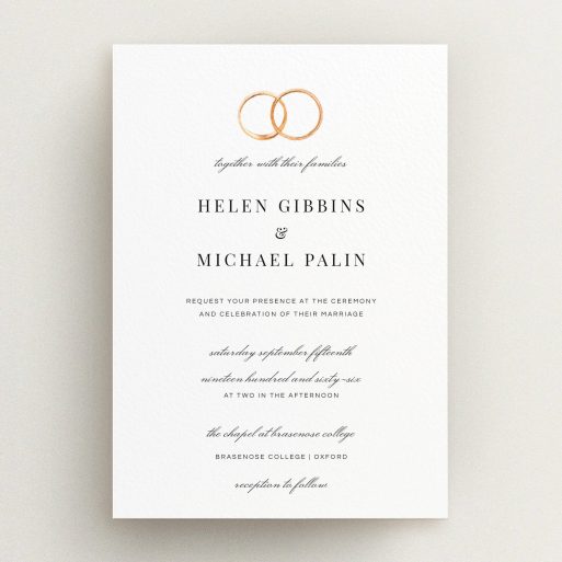 A wedding invite card named "The newlyweds". It is an A5 invite in a portrait orientation. "The newlyweds" is available as a flat invite, with tones of white and gold.