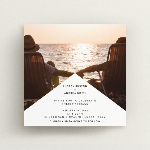 A wedding invite card design titled "Triangle between us". It is a square (148mm x 148mm) invite in a square orientation. It is a photographic wedding invite card with room for 1 photo. "Triangle between us" is available as a flat invite, with mainly white colouring.