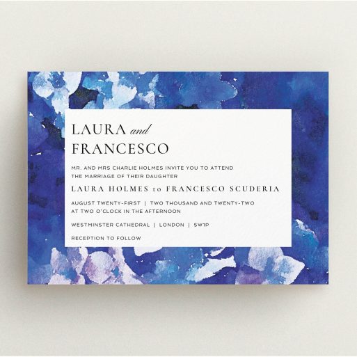 A wedding invite card called "Violets". It is an A5 invite in a landscape orientation. "Violets" is available as a flat invite, with tones of deep violet, light blue and light purple.