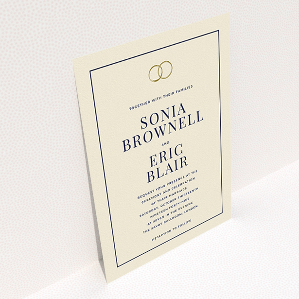 A wedding invite card design named "Wedding bands". It is an A5 invite in a portrait orientation. "Wedding bands" is available as a flat invite, with tones of cream and gold.