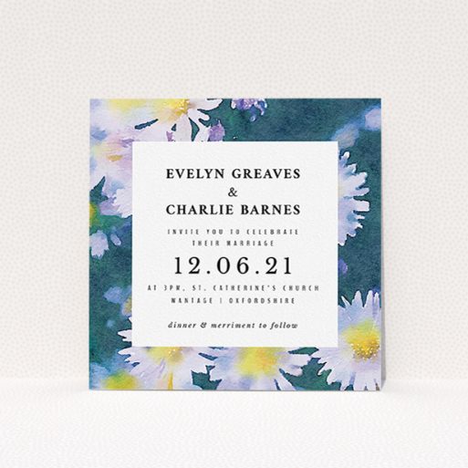 A wedding invite card template titled "White Daisies". It is a square (148mm x 148mm) invite in a square orientation. "White Daisies" is available as a flat invite, with tones of deep green, white and yellow.