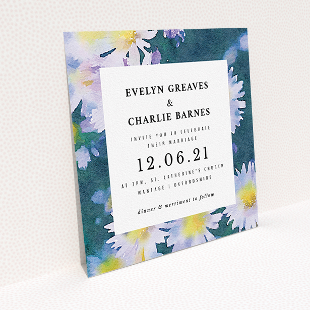 A wedding invite card template titled "White Daisies". It is a square (148mm x 148mm) invite in a square orientation. "White Daisies" is available as a flat invite, with tones of deep green, white and yellow.