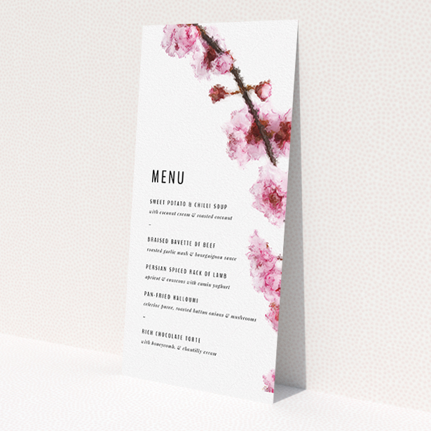 A wedding menu card design called 'A side of Blossom'. It is a tall (DL) menu in a portrait orientation. 'A side of Blossom' is available as a flat menu, with tones of pink and white.