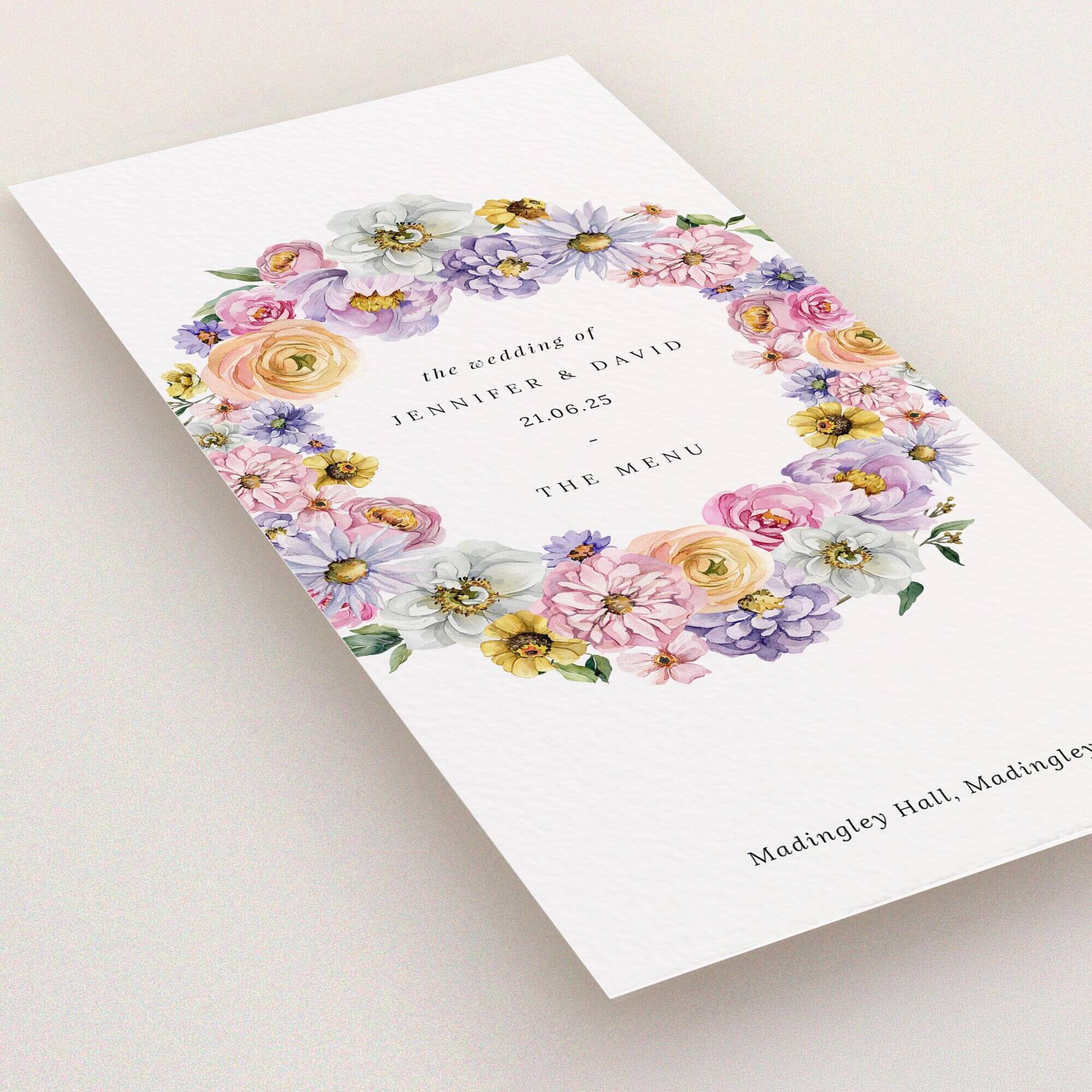 Ornate floral wedding menu card design with colourful flower wreath and text, no photos