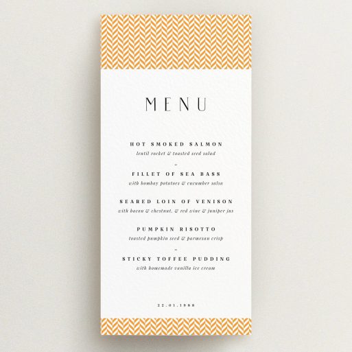 Wedding Menu Card Design - "Orange Houndstooth" A wedding menu card design called "Orange Houndstooth". It is a tall (DL) menu in a portrait orientation. "Orange Houndstooth" is available as a flat menu, with tones of orange and white.