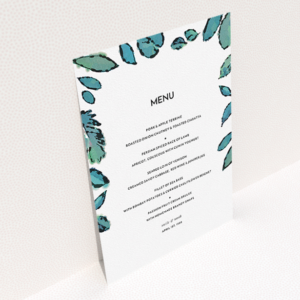 A wedding menu card design called "Woodland Flourish". It is an A5 menu in a portrait orientation. "Woodland Flourish" is available as a flat menu, with tones of green and white.
