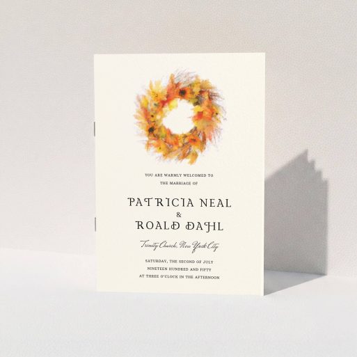 A wedding order of service design called "Autumn wreath ". It is an A5 booklet in a portrait orientation. "Autumn wreath " is available as a folded booklet booklet, with tones of orange and cream.