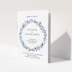 A wedding order of service design titled "Blue Wildflower". It is an A5 booklet in a portrait orientation. "Blue Wildflower" is available as a folded booklet booklet, with tones of light blue, purple and grey.