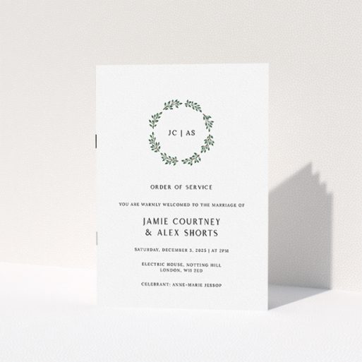 A wedding order of service called "Bold Wreath Monogrammed". It is an A5 booklet in a portrait orientation. "Bold Wreath Monogrammed" is available as a folded booklet booklet, with tones of white and green.