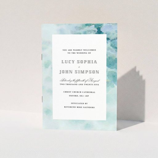 A wedding order of service design called "Calm Waters Cover". It is an A5 booklet in a portrait orientation. "Calm Waters Cover" is available as a folded booklet booklet, with tones of blue and white.
