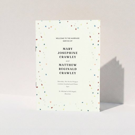 A wedding order of service template titled "Crayon splinters". It is an A5 booklet in a portrait orientation. "Crayon splinters" is available as a folded booklet booklet, with tones of pale cream and orange.