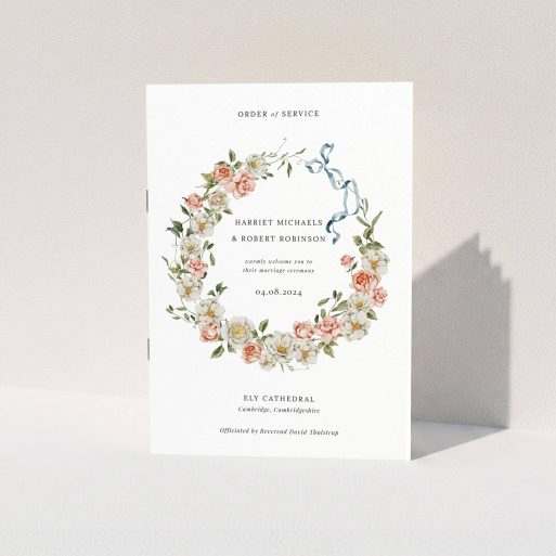 Floral wedding order of service program with elegant wreath design and no photos.