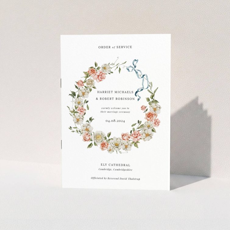 Floral wedding order of service program with elegant wreath design and no photos.