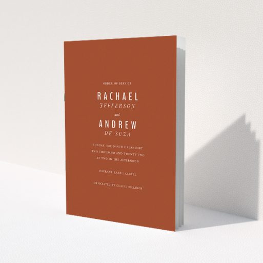 A wedding order of service named 'Ochre with Typography'. It is an A5 booklet in a portrait orientation. 'Ochre with Typography' is available as a folded booklet booklet, with mainly dark orange colouring.