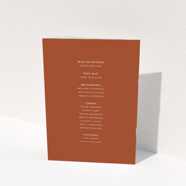 A wedding order of service named "Ochre with Typography". It is an A5 booklet in a portrait orientation. "Ochre with Typography" is available as a folded booklet booklet, with mainly dark orange colouring.