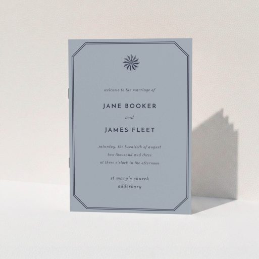 A wedding order of service called "Shaded sundial". It is an A5 booklet in a portrait orientation. "Shaded sundial" is available as a folded booklet booklet, with tones of dark grey and navy blue.