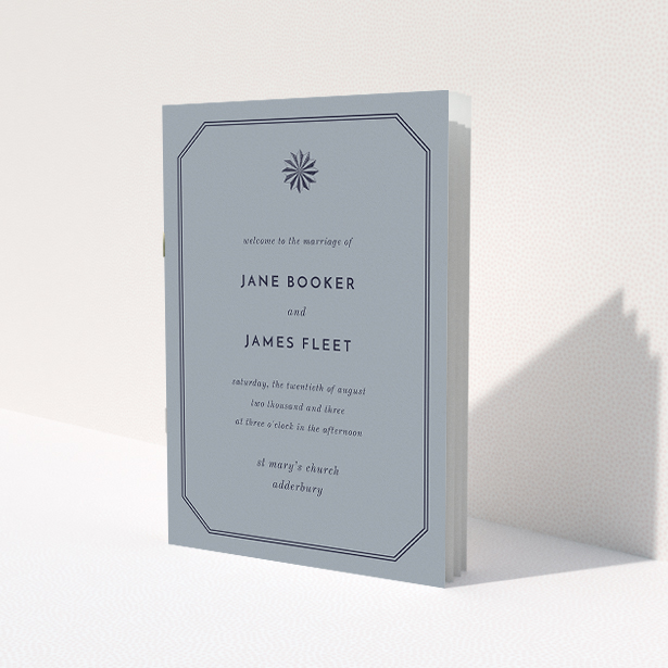 A wedding order of service called "Shaded sundial". It is an A5 booklet in a portrait orientation. "Shaded sundial" is available as a folded booklet booklet, with tones of dark grey and navy blue.