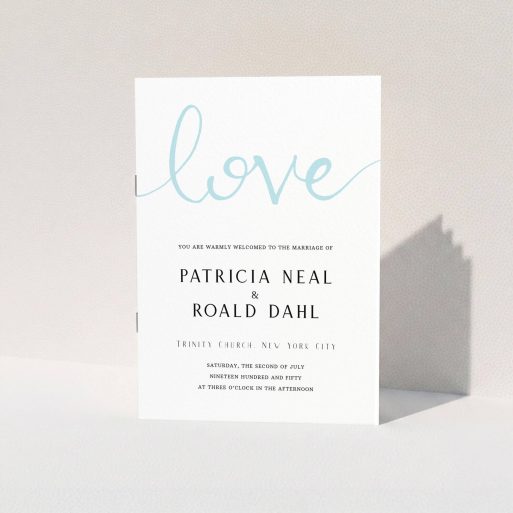 A wedding order of service design titled "Simply Love". It is an A5 booklet in a portrait orientation. "Simply Love" is available as a folded booklet booklet, with tones of white and blue.