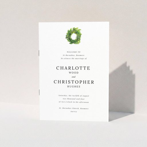 Wedding Order Of Service Design - "Spring Wreath" A wedding order of service template titled "Spring Wreath". It is an A5 booklet in a portrait orientation. "Spring Wreath" is available as a folded booklet booklet, with tones of white and green.