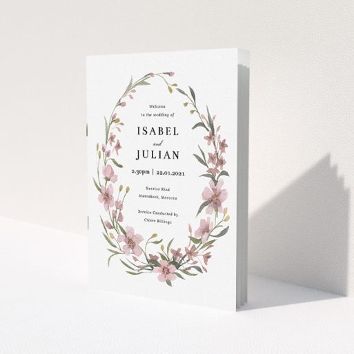 A wedding order of service design called 'True Watercolour Cover'. It is an A5 booklet in a portrait orientation. 'True Watercolour Cover' is available as a folded booklet booklet, with tones of faded pink and autumnal green.