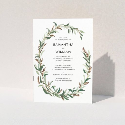 A wedding order of service design named "Winter Wreath". It is an A5 booklet in a portrait orientation. "Winter Wreath" is available as a folded booklet booklet, with tones of faded green, light brown and light green.