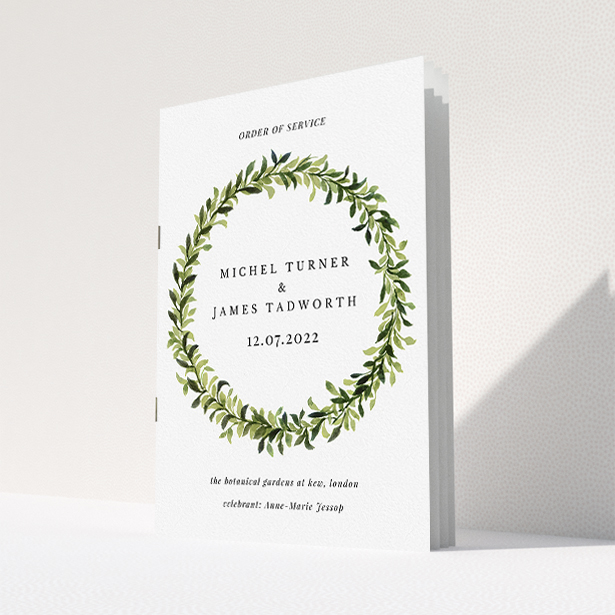 A wedding program called "Classic Wreath Cover". It is an A5 booklet in a portrait orientation. "Classic Wreath Cover" is available as a folded booklet booklet, with tones of light green, dark green and orange.