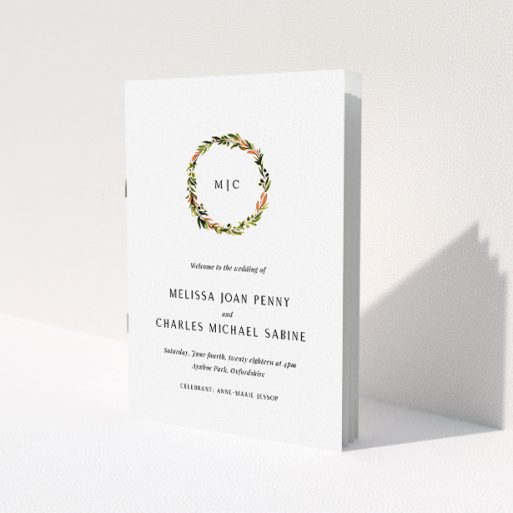 A wedding program named 'Floral Monogram'. It is an A5 booklet in a portrait orientation. 'Floral Monogram' is available as a folded booklet booklet, with tones of white and Orange.