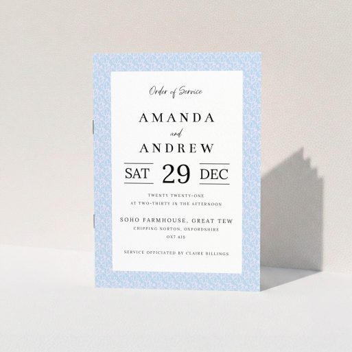 A wedding program called "Flower Pattern". It is an A5 booklet in a portrait orientation. "Flower Pattern" is available as a folded booklet booklet, with tones of blue and pink.