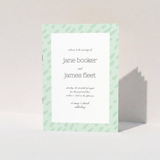 Wedding Program Design - "Green Strokes" A wedding program design called "Green Strokes". It is an A5 booklet in a portrait orientation. "Green Strokes" is available as a folded booklet booklet, with tones of green and white.