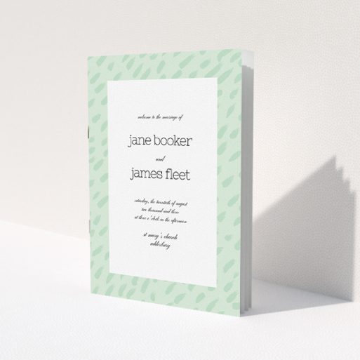 A wedding program design called 'Green Strokes'. It is an A5 booklet in a portrait orientation. 'Green Strokes' is available as a folded booklet booklet, with tones of green and white.