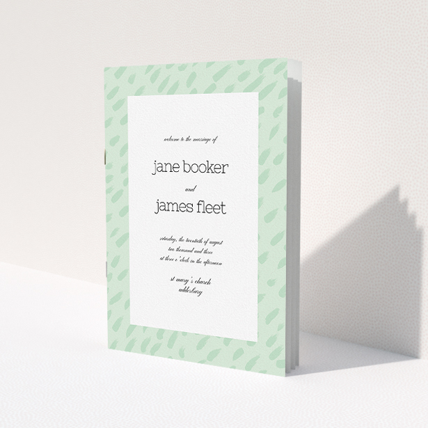 A wedding program design called 'Green Strokes'. It is an A5 booklet in a portrait orientation. 'Green Strokes' is available as a folded booklet booklet, with tones of green and white.