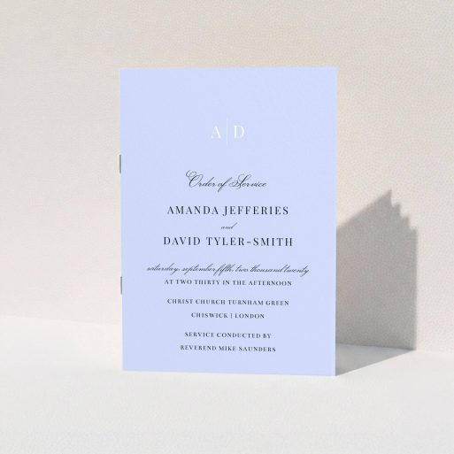 A wedding program called "Light Blue Monogrammed". It is an A5 booklet in a portrait orientation. "Light Blue Monogrammed" is available as a folded booklet booklet, with tones of blue and white.