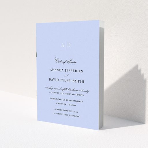 A wedding program called 'Light Blue Monogrammed'. It is an A5 booklet in a portrait orientation. 'Light Blue Monogrammed' is available as a folded booklet booklet, with tones of blue and white.