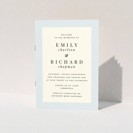 A wedding program template titled "Simple Blue Order of Service". It is an A5 booklet in a portrait orientation. "Simple Blue Order of Service" is available as a folded booklet booklet, with tones of blue and pink.