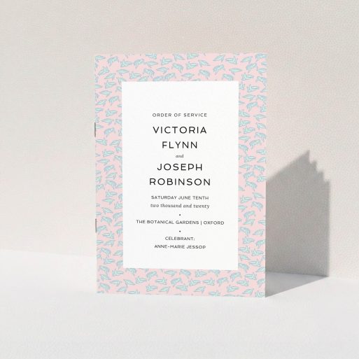 A wedding program design named "Tiny, Tiny Turtles". It is an A5 booklet in a portrait orientation. "Tiny, Tiny Turtles" is available as a folded booklet booklet, with tones of blue and pink.