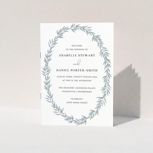 Wedding Program Design - "Tussled Wreath" A wedding program named "Tussled Wreath". It is an A5 booklet in a portrait orientation. "Tussled Wreath" is available as a folded booklet booklet, with tones of blue and white.