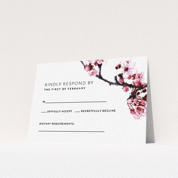 A wedding response card design called "A side of Blossom". It is an A7 card in a landscape orientation. "A side of Blossom" is available as a flat card, with tones of pink and white.