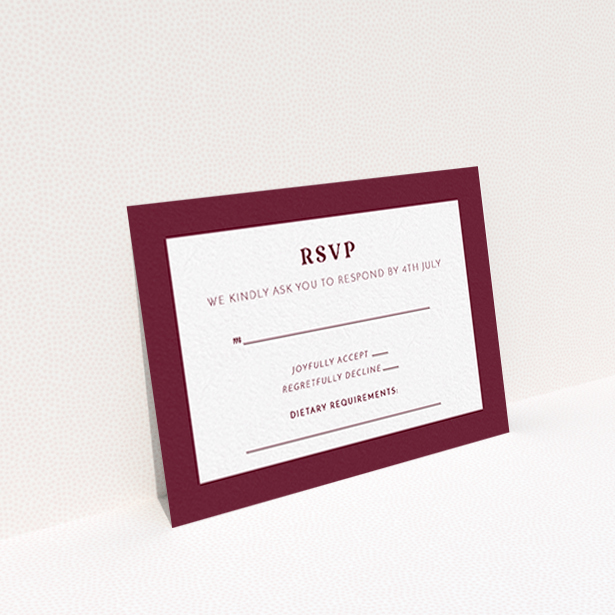 A wedding response card design called "Bold border". It is an A7 card in a landscape orientation. "Bold border" is available as a flat card, with tones of burgundy and white.