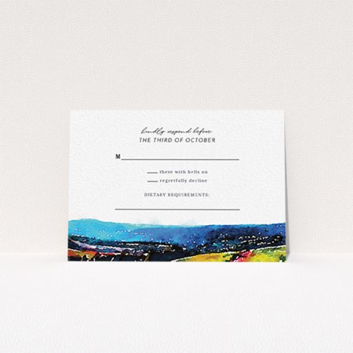 A wedding response card called "Country Road". It is an A7 card in a landscape orientation. "Country Road" is available as a flat card, with tones of white and blue.