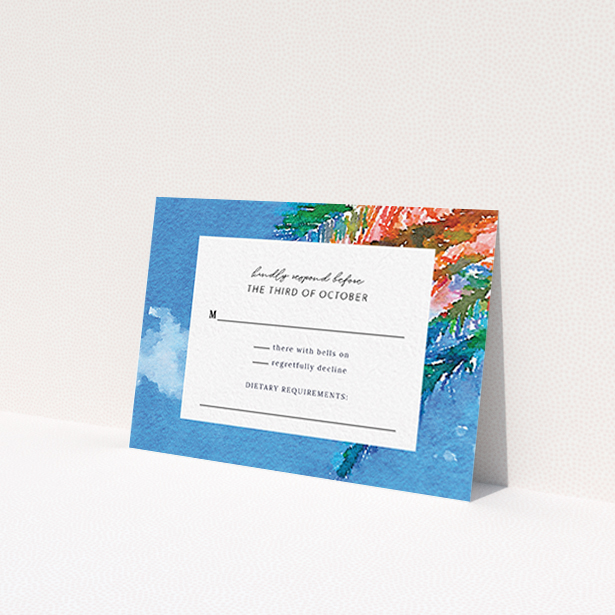 A wedding response card design called "From the Sunbed". It is an A7 card in a landscape orientation. "From the Sunbed" is available as a flat card, with tones of sky blue and green.