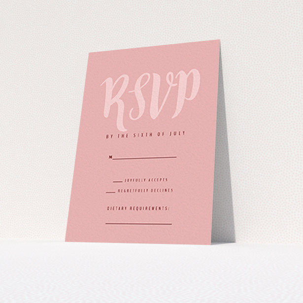 A wedding response card called "Pastel Pink Typography". It is an A7 card in a portrait orientation. "Pastel Pink Typography" is available as a flat card, with mainly pink colouring.