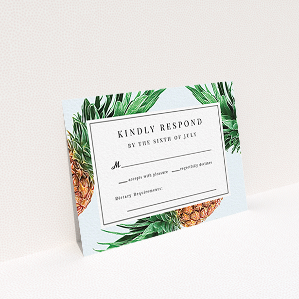 A wedding response card design titled "Pineapples falling". It is an A7 card in a landscape orientation. "Pineapples falling" is available as a flat card, with tones of light blue, green and brown.