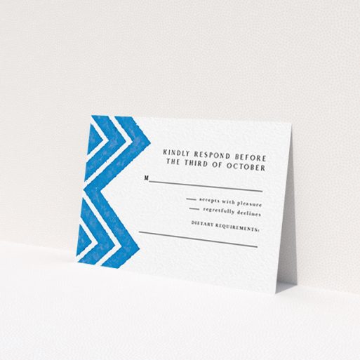 A wedding response card template titled 'Skiapthos'. It is an A7 card in a landscape orientation. 'Skiapthos' is available as a flat card, with tones of blue and white.