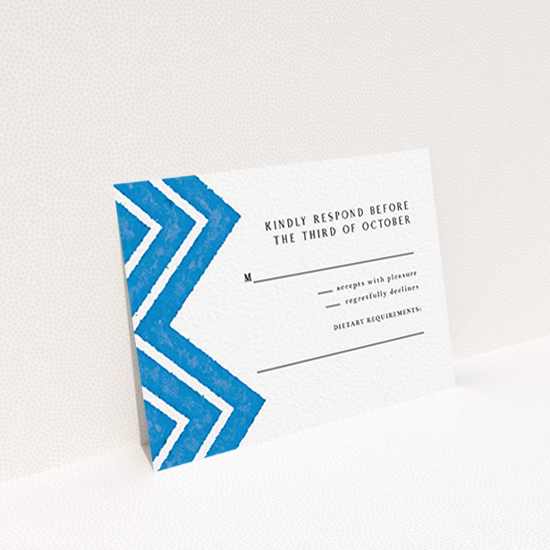 A wedding response card template titled "Skiapthos". It is an A7 card in a landscape orientation. "Skiapthos" is available as a flat card, with tones of blue and white.